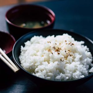Bowl of rice and miso soup on table