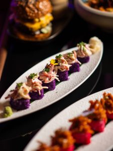 Colorful sushi rolls with toppings