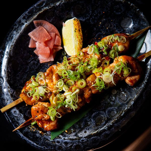 Grilled shrimp skewers with green onions